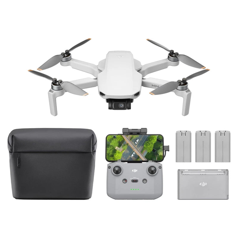 Camera drone kit with white quadcopter, remote controller, case, batteries and mount