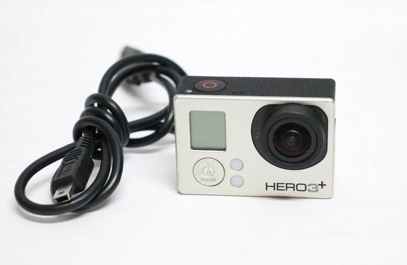 GoPro HERO3+ action camera with front lens, buttons, and connected cable