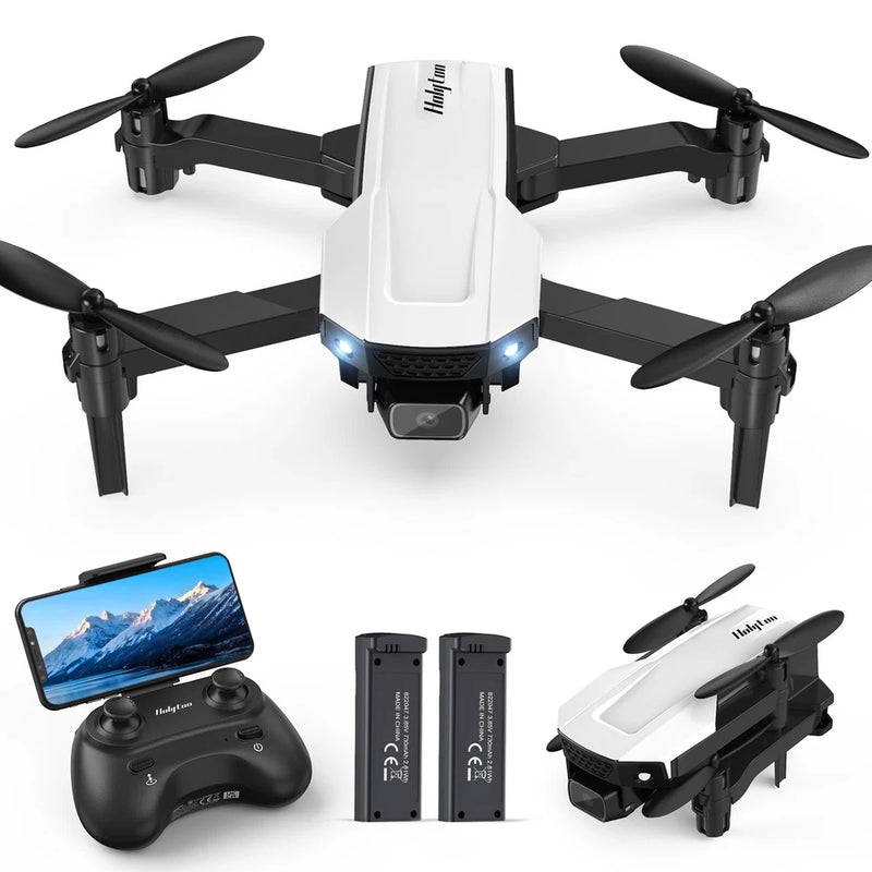 White and black Holyton quadcopter drone with propellers, controller, and two batteries