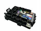 12V battery fuse box with black plastic housing and multiple colored fuse slots