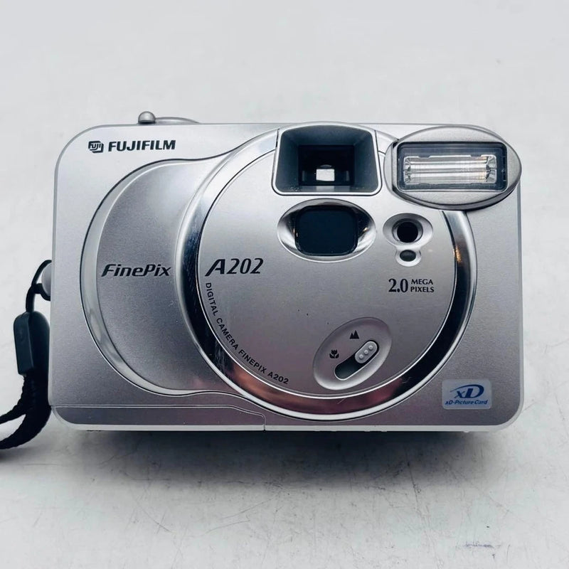 FUJIFILM FinePix compact digital camera (silver) front view with lens and flash
