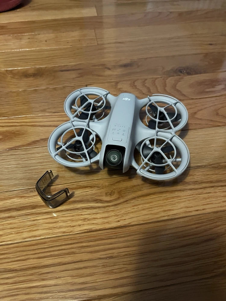 DJI NEO quadcopter drone with four rotors and foldable arms