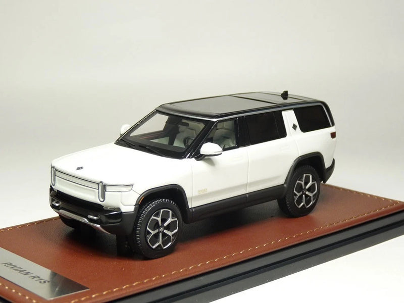 White Rivian R1S electric truck resin model car on brown display base