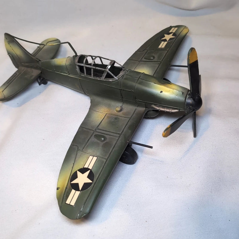 Olive green WWII plane replica decoration with star markings and rotating propeller