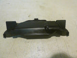 Honda motorcycle battery cover, black plastic panel with cutouts and mounting tabs