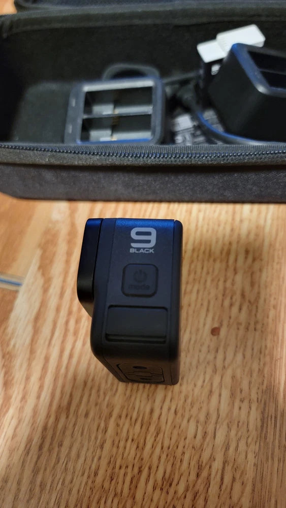 GoPro HERO9 black action camera body with mount tab
