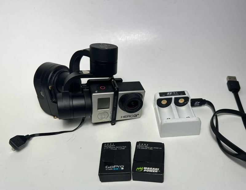 GoPro HERO3+ action cam kit with black housing, silver camera, batteries and mount