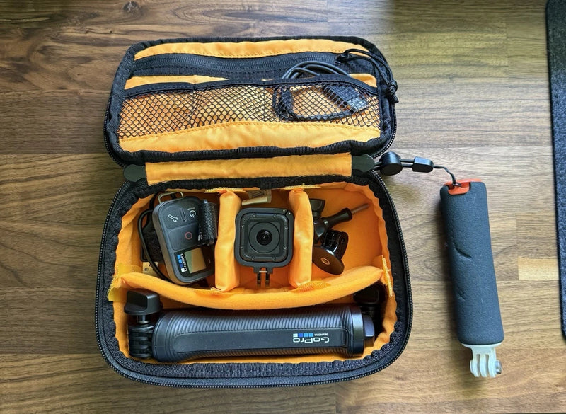 GoPro Hero 4 Session camera with accessories in open padded carrying case