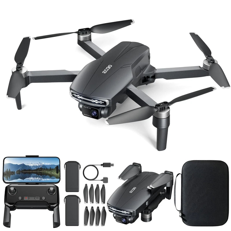 Black quadcopter drone with built-in camera, four foldable propellers, compact remote kit