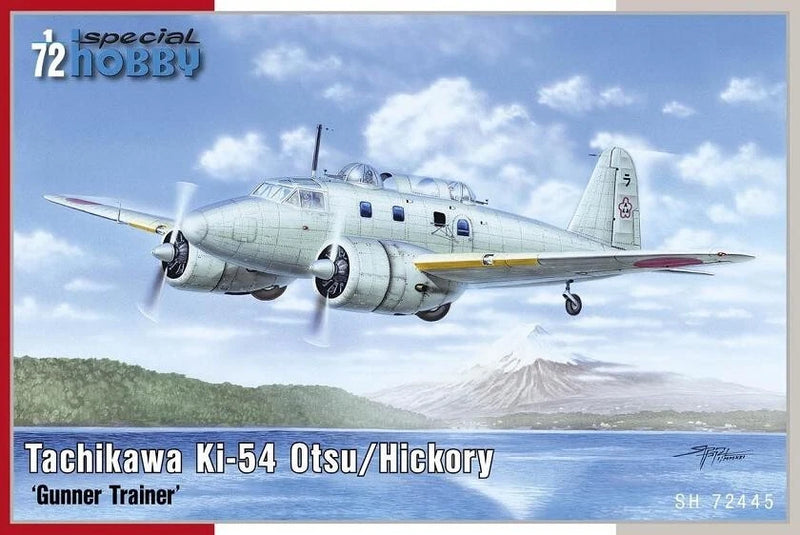 Light gray twin-engine WWII-style gunner trainer scale model aircraft with yellow stripe