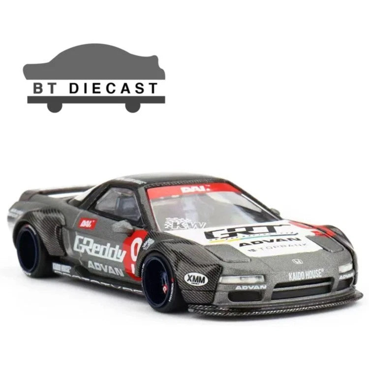 Black 1/64 die-cast race car, #9 livery, front 3/4 view with sponsor decals