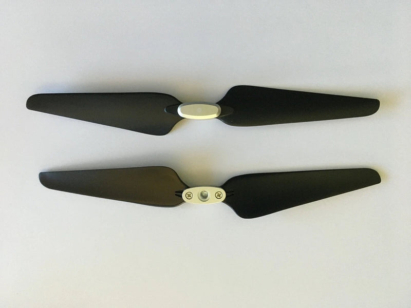 Drone propellers, dark gray blades with yellow hub connectors