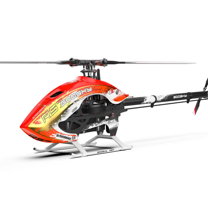 Orange RC helicopter kit with black tail boom and skid landing gear, rotorcraft model