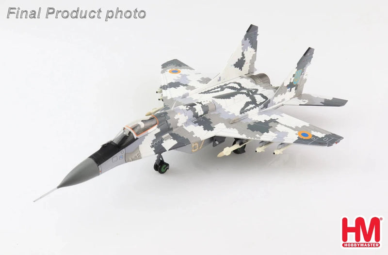 1/72 scale fighter jet model with gray camouflage and Ukrainian insignia markings