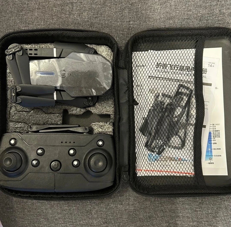 4K HD drone kit case with controller, folded drone, mesh pocket and manual