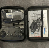 4K HD drone kit case with controller, folded drone, mesh pocket and manual