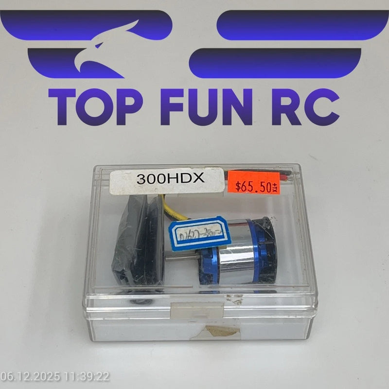 Brushed RC outrunner motor with mounting bracket, in clear retail box.
