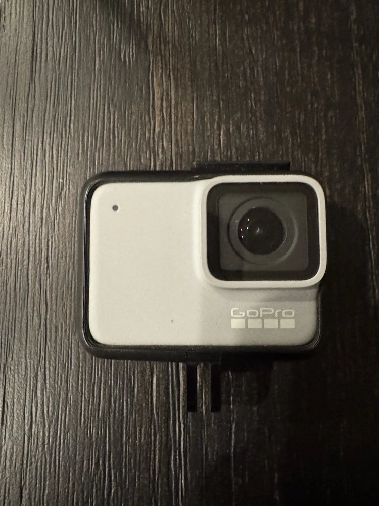 GoPro white action camera front with lens and GoPro logo