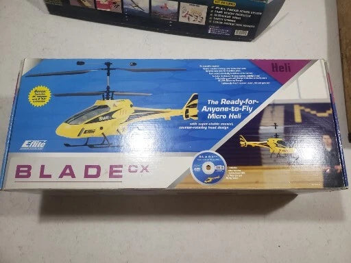 E-Flite Blade CX micro helicopter box with helicopter artwork and accessories