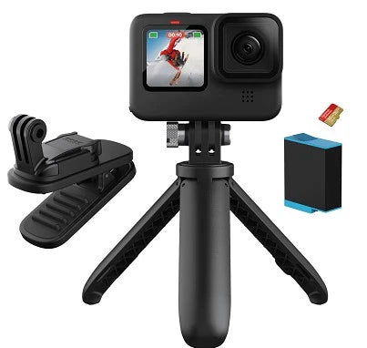 Black action camera on foldable tripod grip with mount accessories