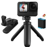 Black action camera on foldable tripod grip with mount accessories
