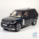 Black 1:32 diecast SUV model car with detailed grille and headlights, front view