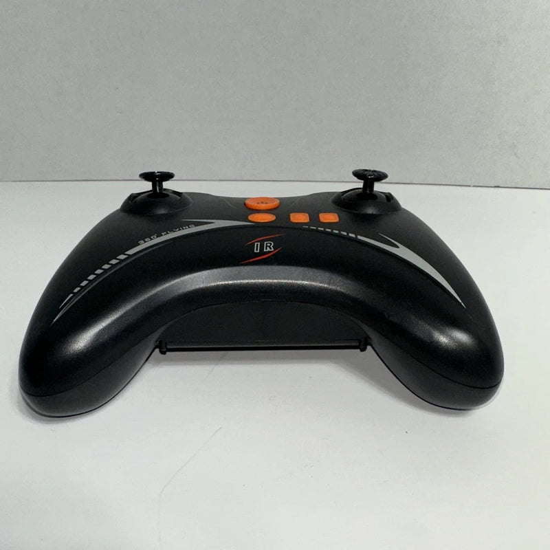Black IR drone remote controller gamepad with orange buttons and top sticks