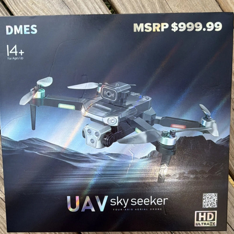 Four-axis UAV drone on retail box, compact quadcopter with camera and four propellers