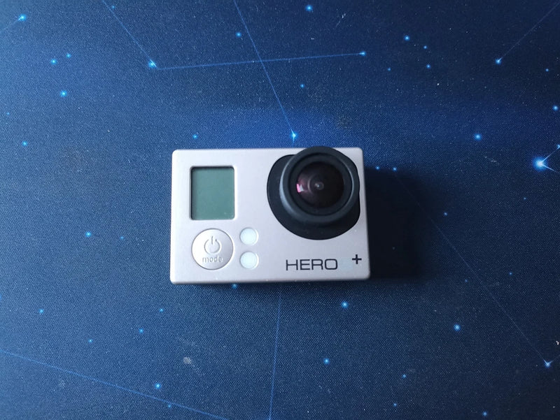 GoPro Hero 3+ silver action camera with black lens and HERO+ button panel