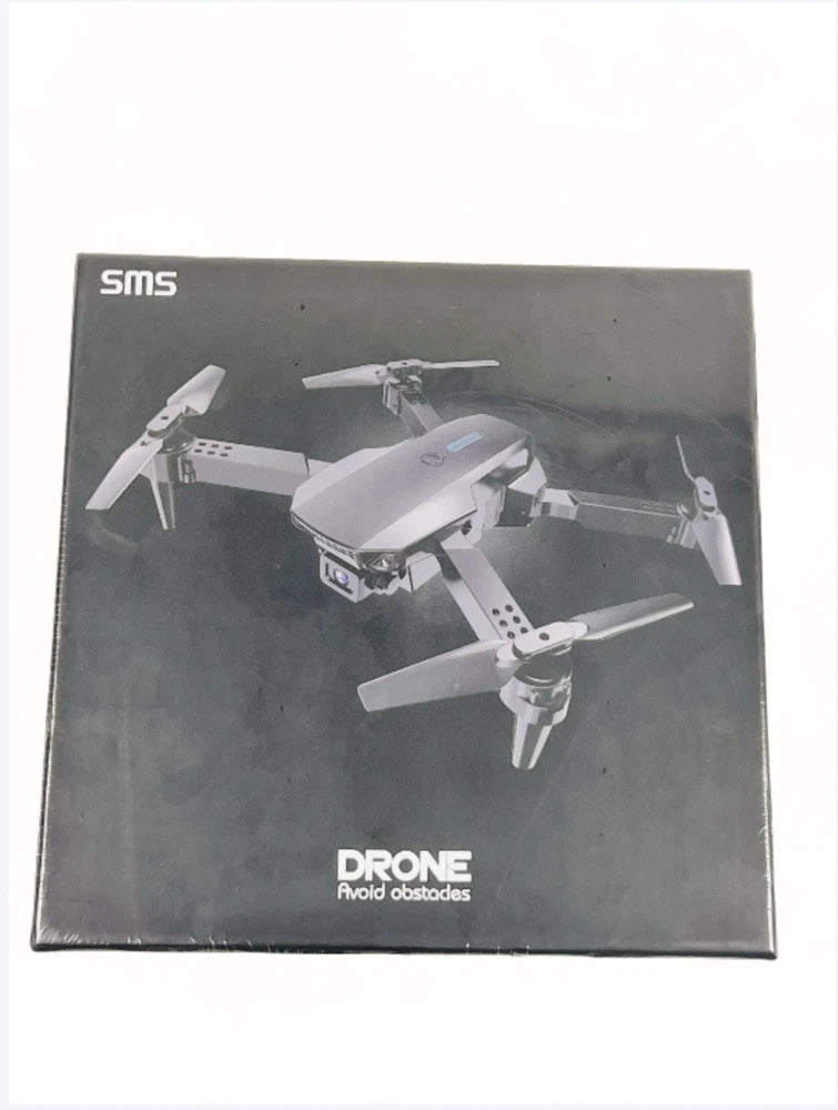 Foldable quadcopter drone packaging box with attached drone graphic