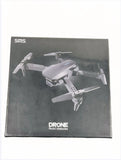 Foldable quadcopter drone packaging box with attached drone graphic