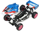 YOKOMO electric RC buggy model with blue/red body, four knobby tires, exposed chassis