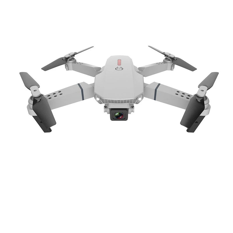 White quadcopter RC drone with front camera and four fold-out propellers