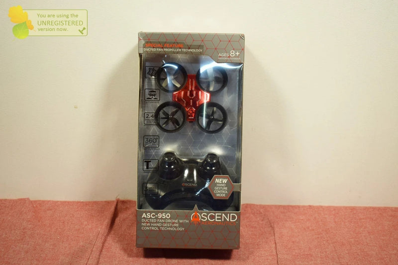 Ducted fan drone toy in retail box, black and red design with four rotors