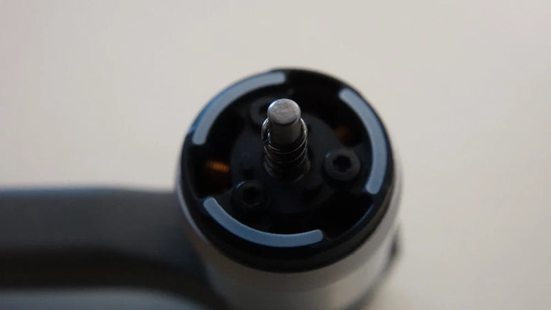 Drone rear motor arm assembly, circular black hub with exposed shaft
