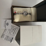 Silver wristwatch with chain bracelet in open box, included papers