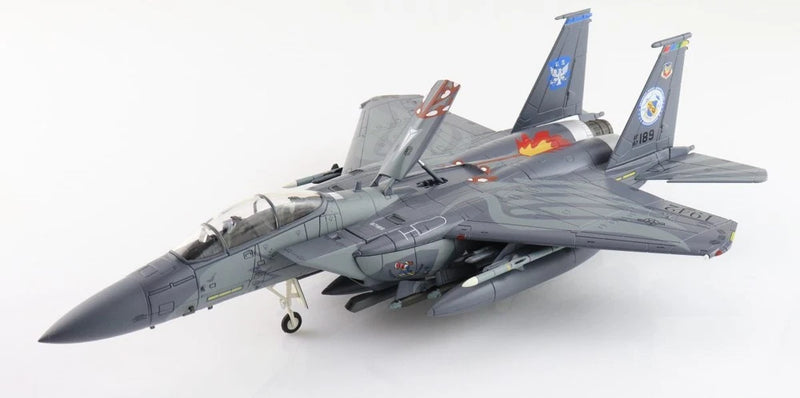 Gray F-15 fighter jet model with detailed cockpit and open intake, side view