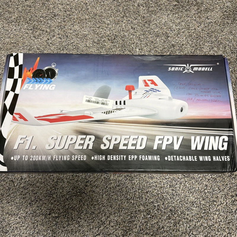 RC FPV wing airplane kit box with white and red model and Sonic Modell branding