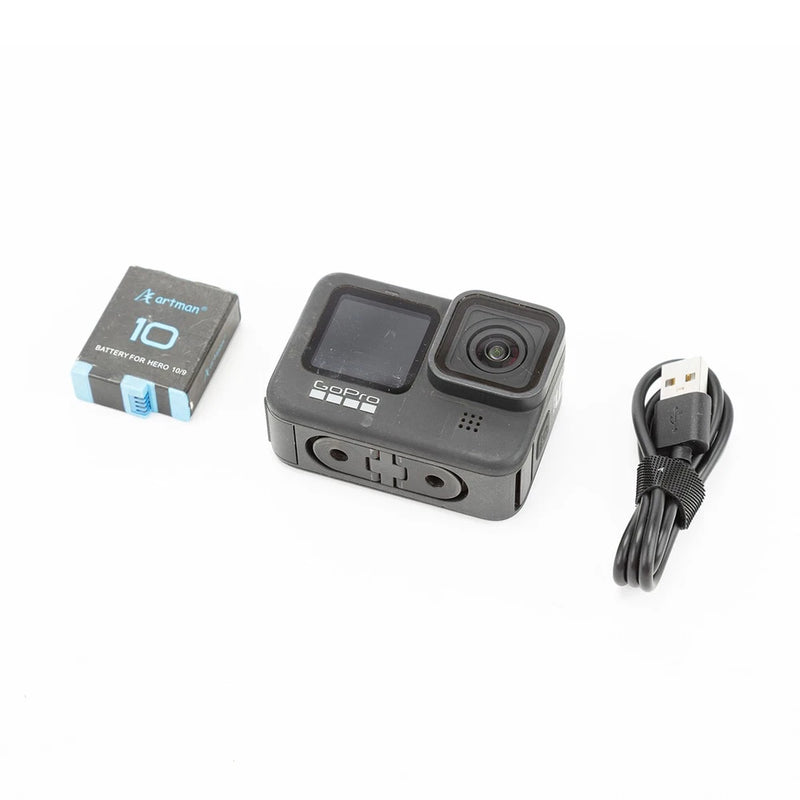 GoPro HERO9 Black action camera with USB cable and accessory box