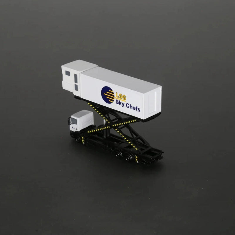 White scale model catering truck with trailer, logo print, yellow-and-black striped ramp