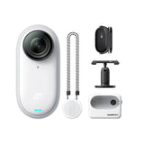 White Insta360 Go 3 compact action camera with wrist strap, mount bracket, and charging case