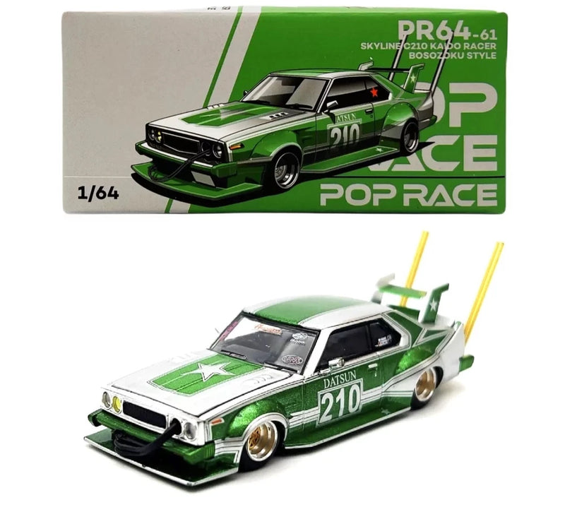 1/64 scale green Nissan Skyline C210 model car with racing decals and black hood