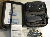 Foldable drone kit with controller and spare parts in padded travel case