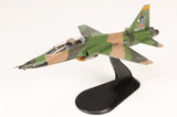 1/72 T-38C Talon model airplane, green desert camo on black display stand
