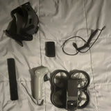 FPV goggles and motion controller with antennas and cables, drone kit components