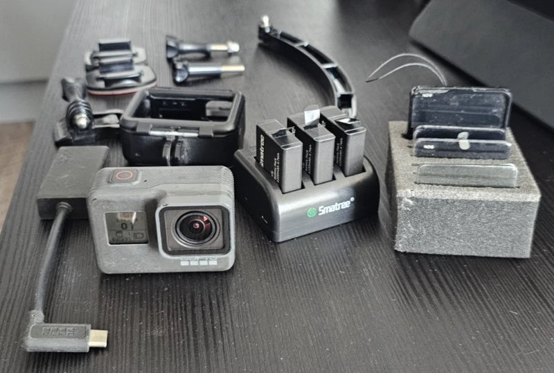 GoPro HERO5 action camera kit with extra batteries and mounts
