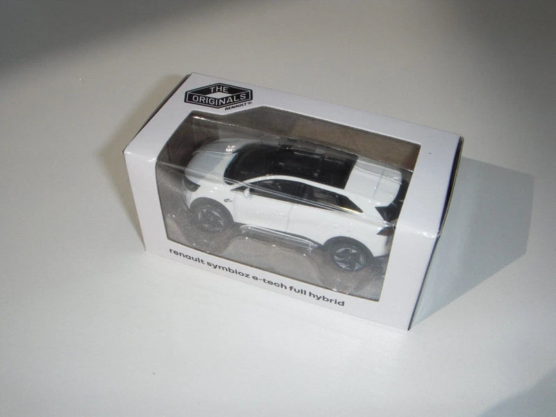 Renault Symbioz 1/64 die-cast model car, white car visible in clear retail box