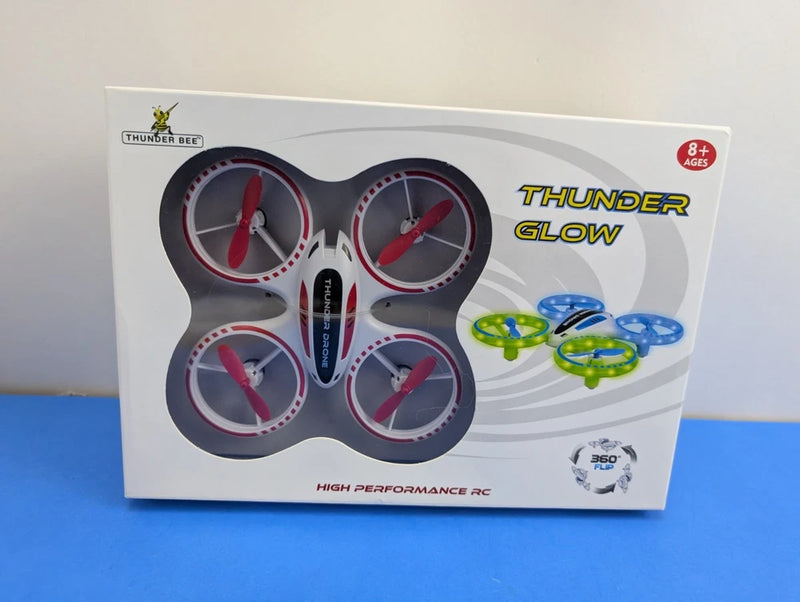 Toy quadcopter drone box with LED lights and remote control