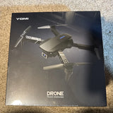 Foldable YOMI quadcopter drone box with front view illustration