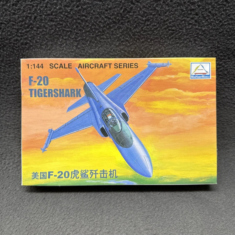 Sealed 1/144 scale F-20 Tigershark airplane model kit box with blue jet artwork